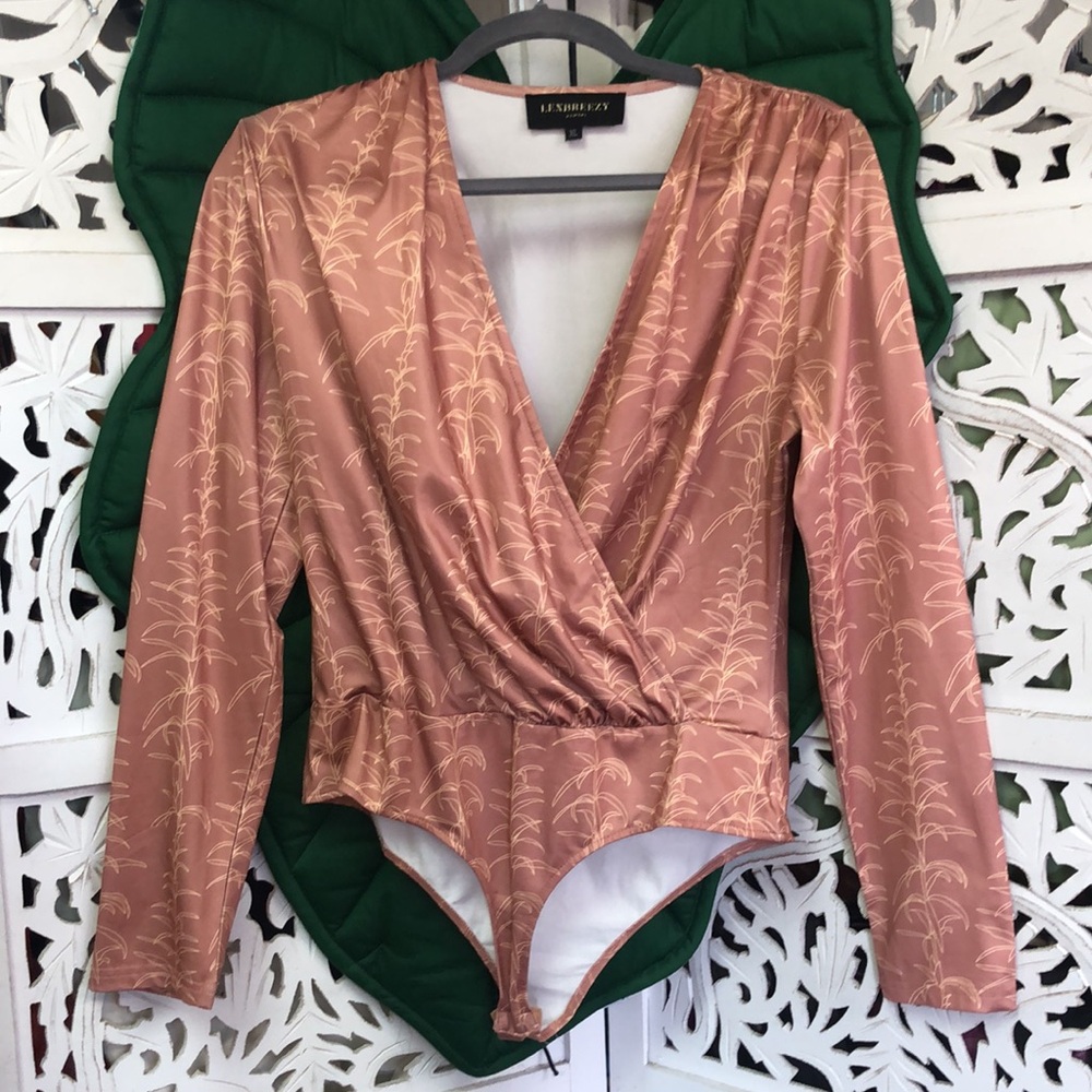 LexBreezy XL one piece long sleeve thong style bodysuit with bottom clasps.